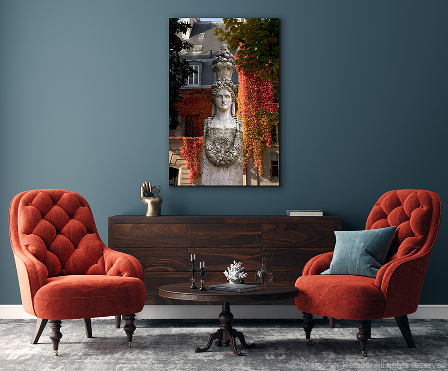 Print of Parisian sculpture by Christopher Petsos hanging in a kitchen