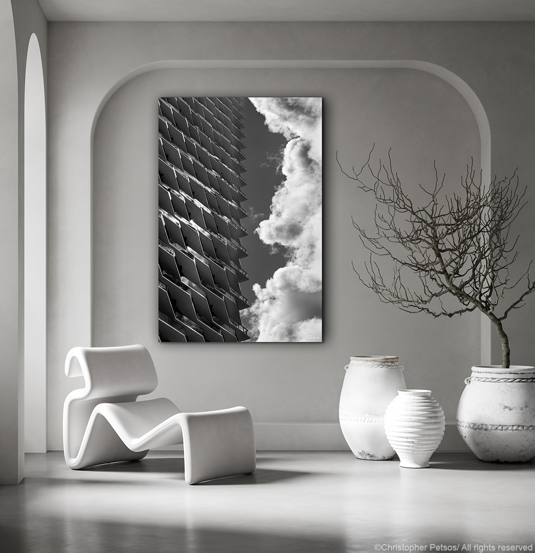 Brickell Miami apartment building Solitair with dramatic cumulus clouds by photographer Christopher Petsos